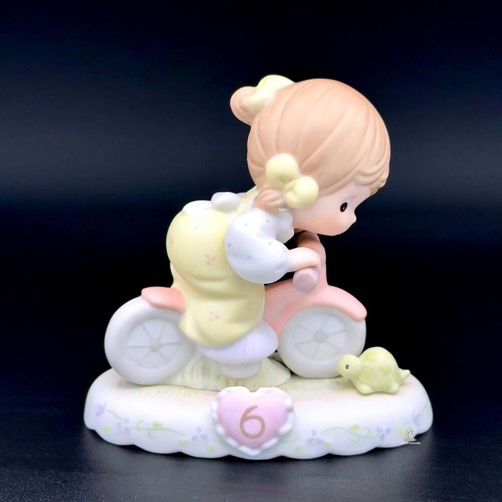 Precious Moments Girl on Pink Tricycle Figurine - Adorable Childhood Memory